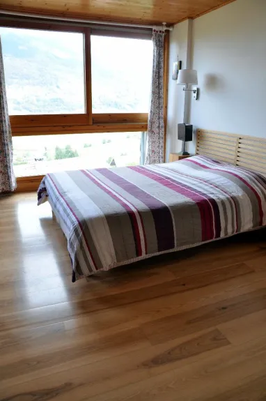 Panoramic room with a queen size bed. Private bathroom with big shower
