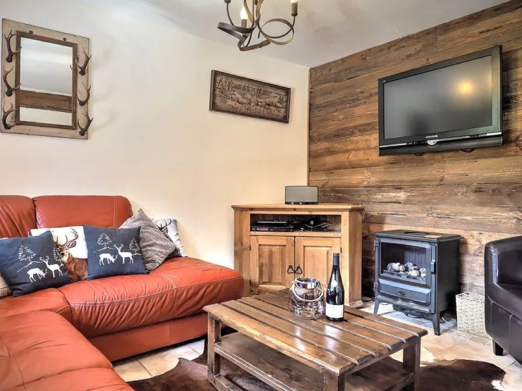 Comfortable and spacious living room with flat screen TV just right for the cold winter nights.
