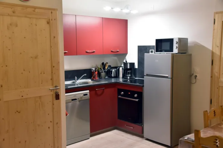 Kitchen equipped with a fridge/freezer, microwave, traditional oven, induction hob, 2 coffee makers (1 filter and 1 Nespresso)