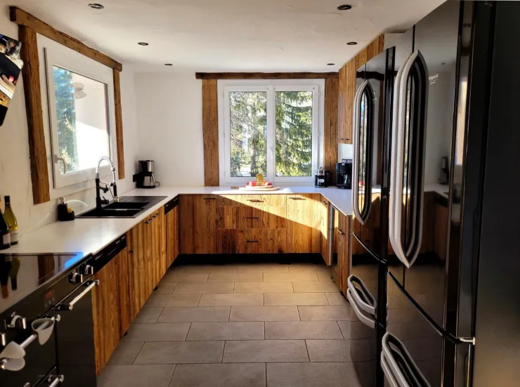 The chalet's kitchen, fully equipped for 24 people.