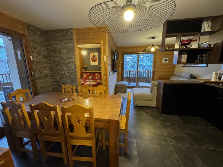 Living area with 2 french doors opening onto the balcony and terrace.