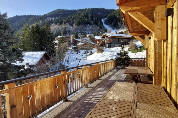 In both summer and winter, the upper terrace is perfect for dining in the sunshine, comfortably seating up to 15 guests.