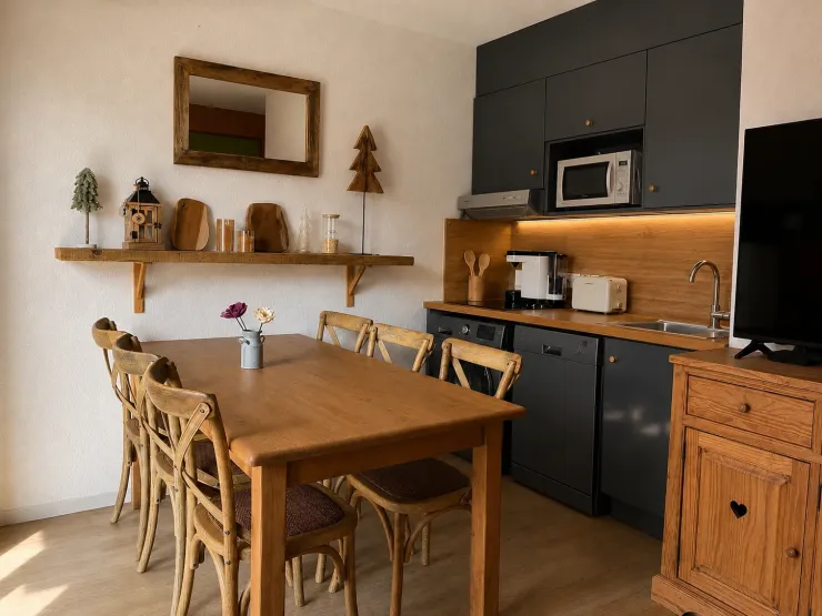 Une petite cuisine équipée d’un lave vaisselle, lave linge séchant, un air fryer, Nespresso, bouilloire, grille pain, four micro-ondes onde, réfrigérateur et congélateur, appareil a raclette pour des moments conviviaux avec vos proches