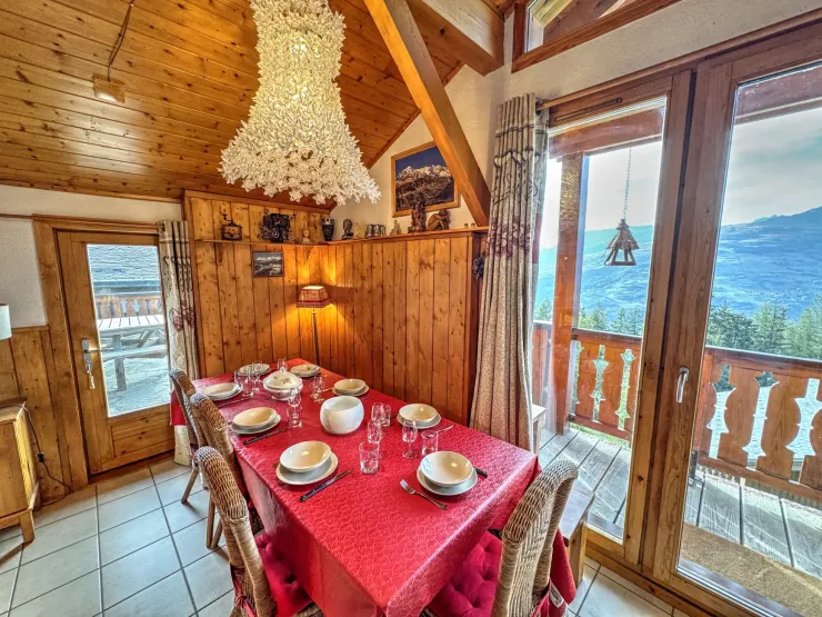 Dining area with views across the valley