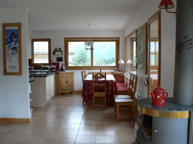 Dining area  : east and southfacing.  Mountains and village view.Open kitchen. 