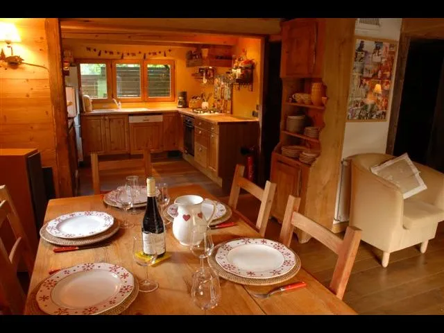 dining room with the open kitchen behind
