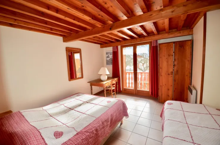 Soldanelle room, 1 couple bed and one single bed.