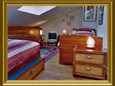 Bedroom 2: 2 single beds 90X200 and 2 truckle beds 90X200. TV/DVD/VCR. Laminate flooring.