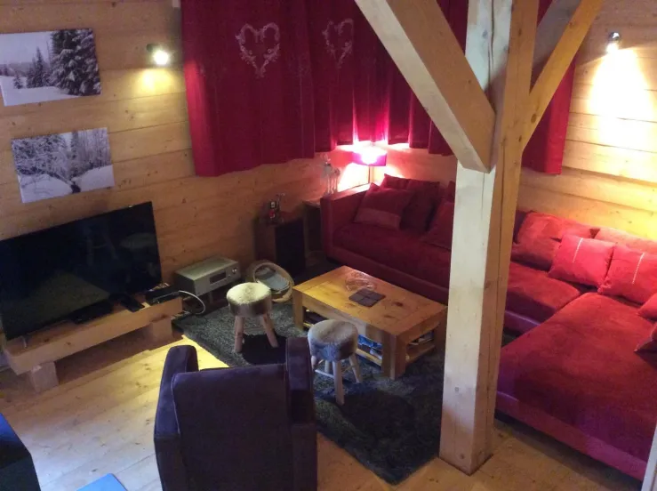 living room with chimney and TV