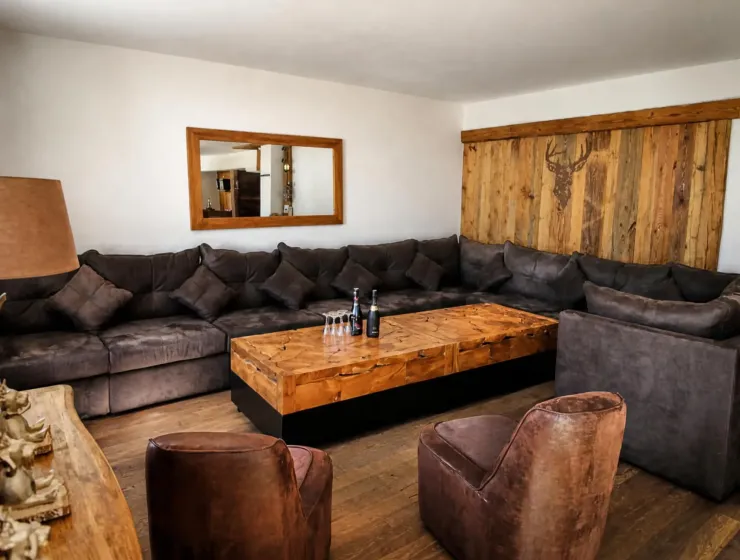 The living room and TV, for enjoying an aperitif with family or friends after a long day of activities in Montgenèvre