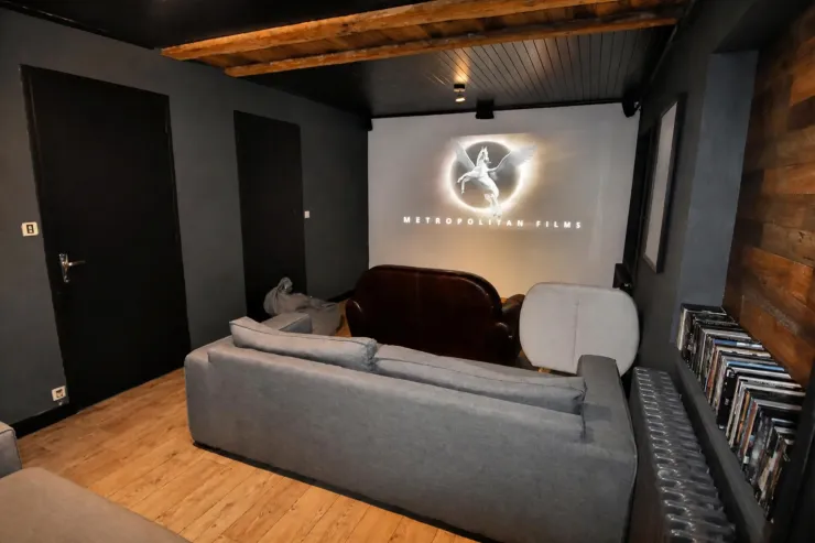 A movie theater on the ground floor (R0) for movie nights with family or friends!